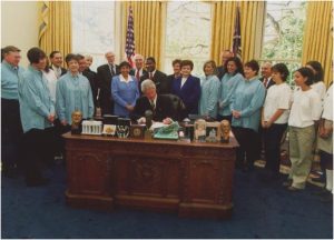 Millie with President Clinton signing .08 law